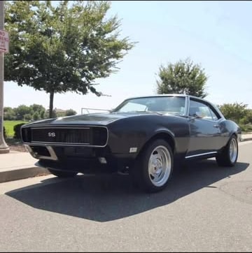 Black first-generation Camaro SS photographed outside after its build